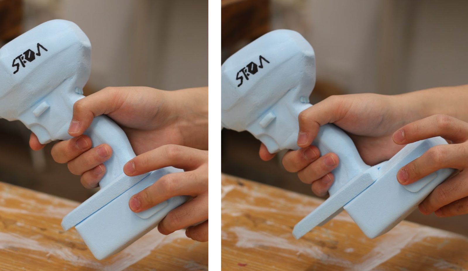 Blue foam model of the impact driver being held, with the battery pack sliding on